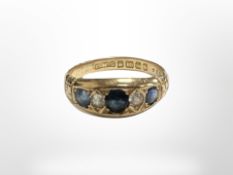 An 18ct yellow gold sapphire and diamond ring, size O/P. CONDITION REPORT: 4.1g.