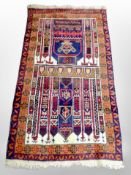 An Iranian prayer rug, 150cm x 82cm.
