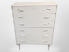 A 1970's Danish teak and pine six drawer chest, later painted,