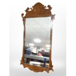 A reproduction burr walnut framed mirror, height 95cm.