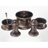 A silver and tortoiseshell-topped inkwell, together with a pair of salts, a pair of sifters,