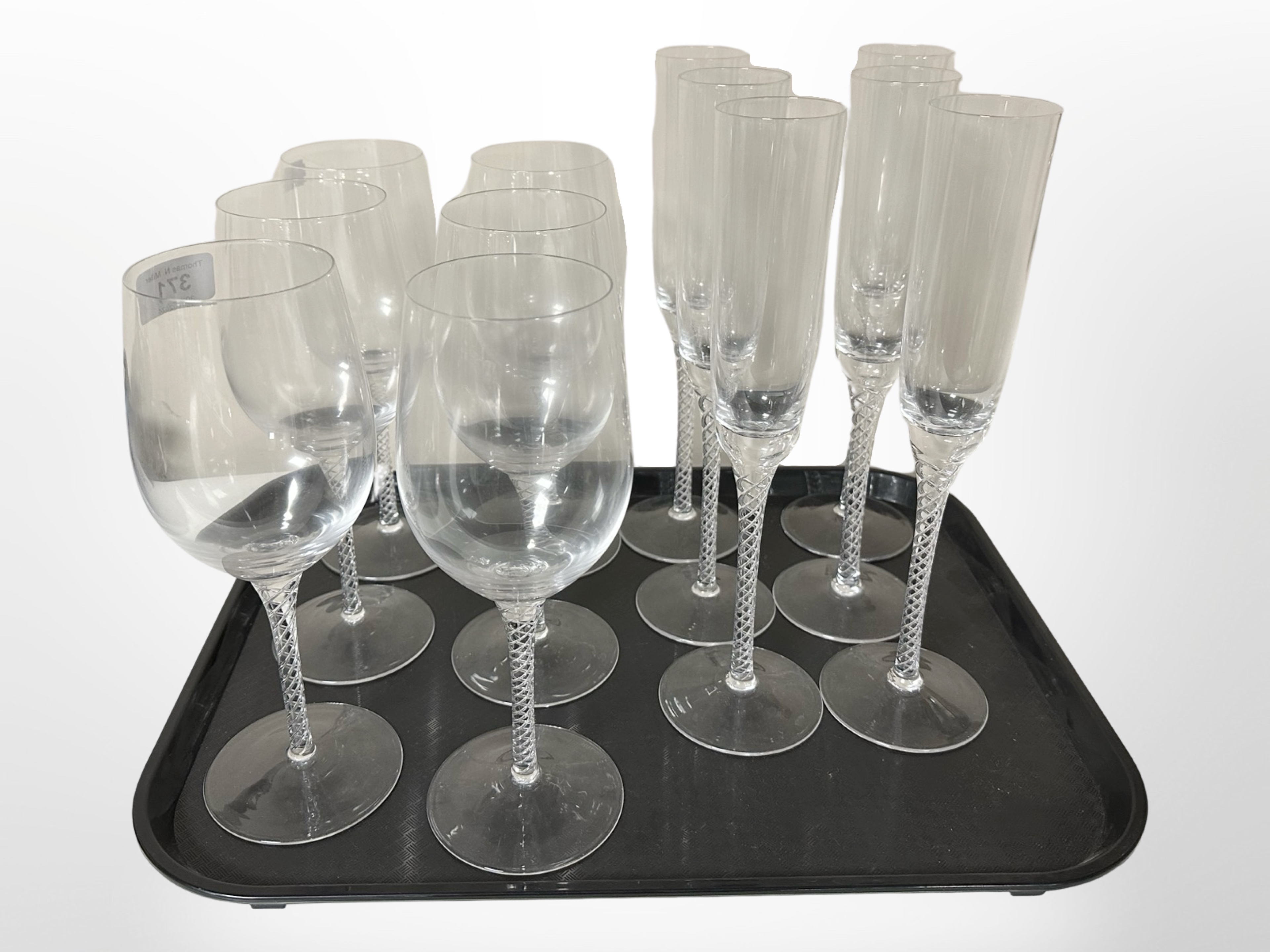 Two sets of Murano crystal wine and champagne glasses.