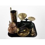 A group of metal wares including graduated brass weights, scales, iron, copper kettle.