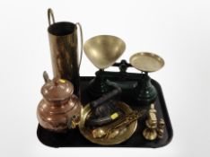 A group of metal wares including graduated brass weights, scales, iron, copper kettle.