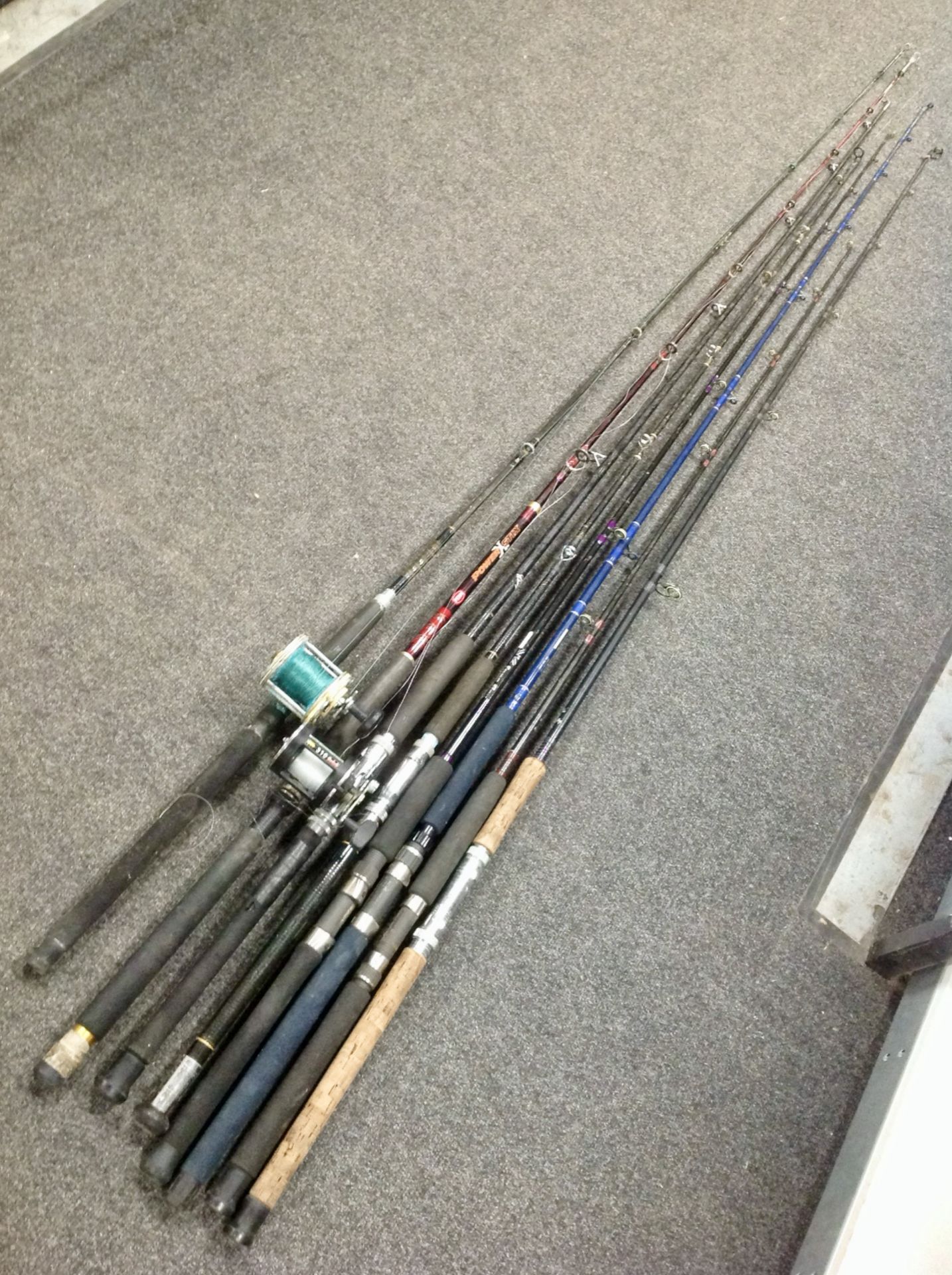 A group of fishing rods including Abu Garcia, Shakespeare, etc.