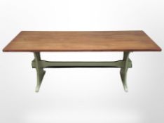 A 20th century Danish teak topped rectangular dining table,