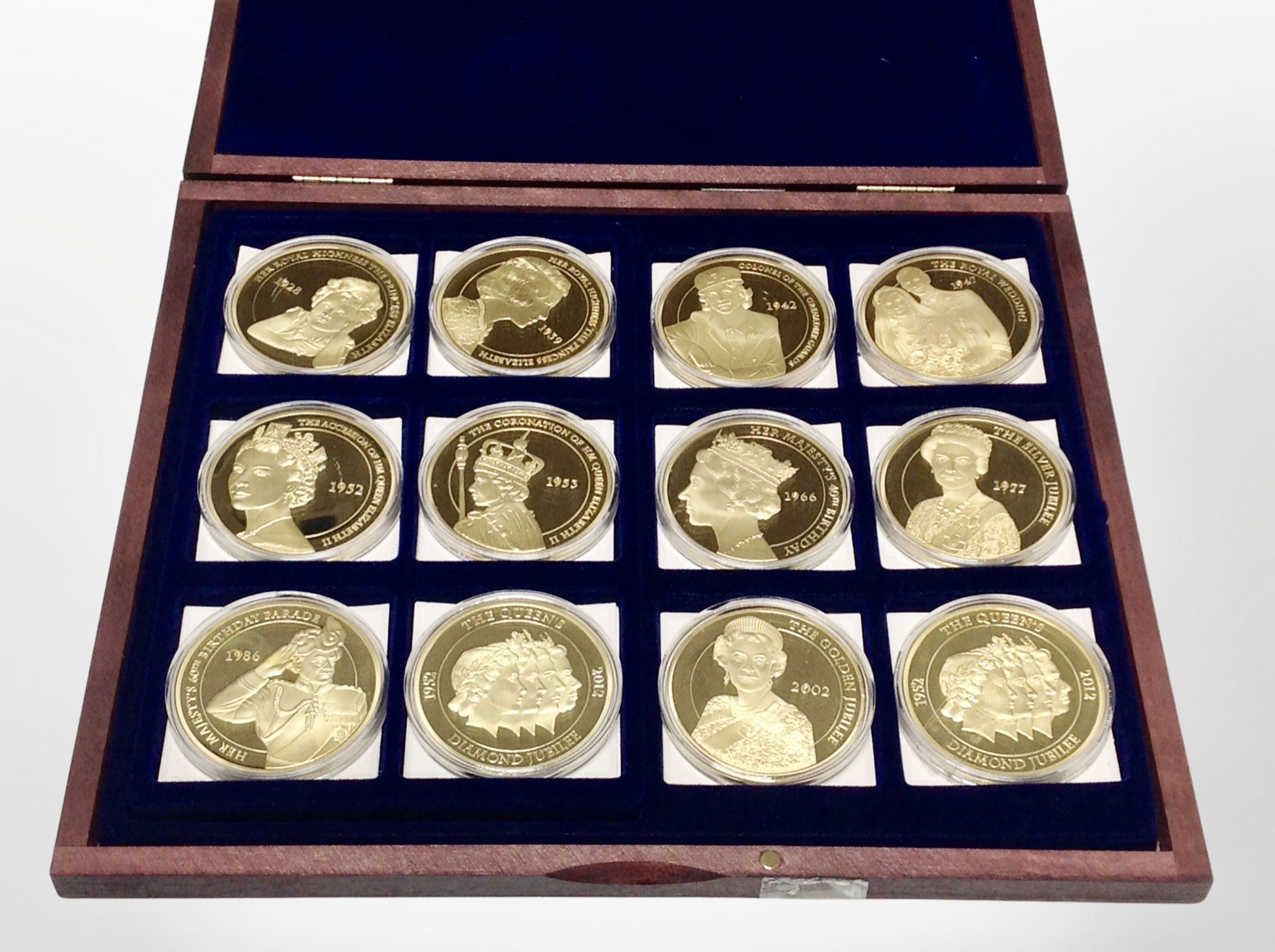 A box set of twelve Queens Jubilee gold plated coins