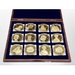 A box set of twelve Queens Jubilee gold plated coins