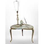 An onyx and gilt metal kidney-shaped occasional table, together with further table lamp, desk stand,