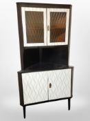 A 1960's Scandinavian melamine corner cabinet,