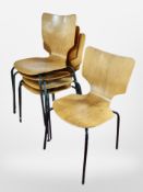 A set of four 20th century Danish laminated teak chairs and one similar chair