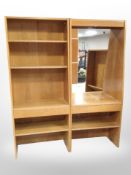 A 20th century Scandinavian oak two section bookcase with mirrored back,