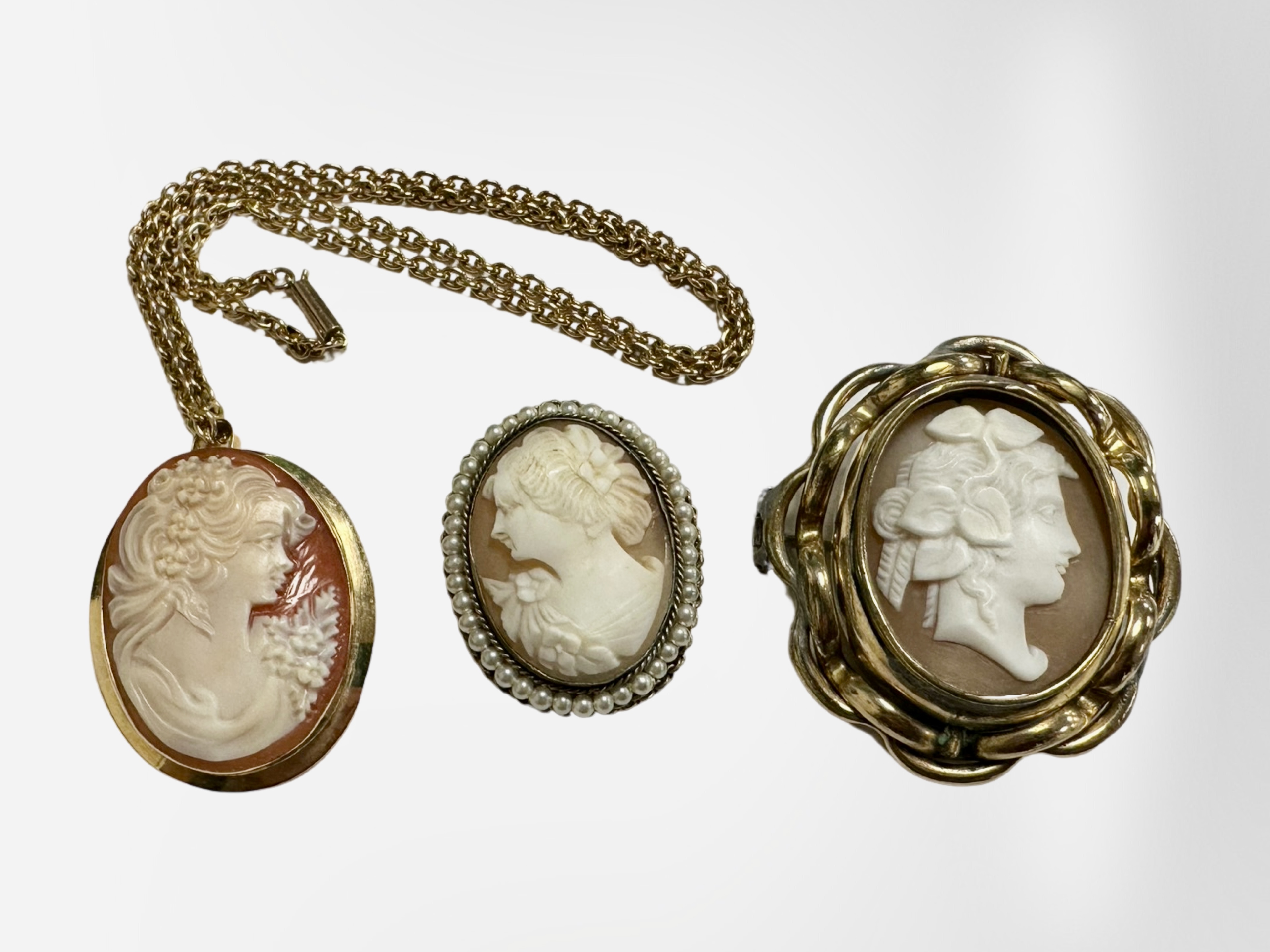 A Victorian cameo brooch together with further cameo brooch mounted in 18ct gold suspended on 15ct