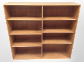 A 1970s Swedish teak open bookcase design by Alf Svensson, width 120cm.