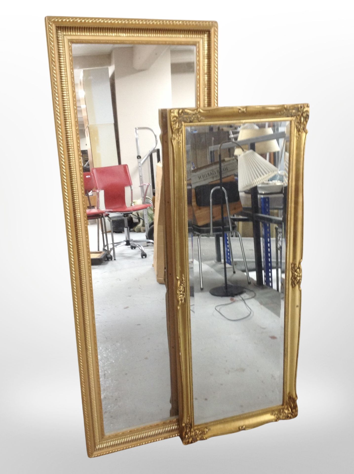 Two rectangular gilt frame mirrors, largest 131cm x 41cm.