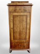 A 19th century Danish walnut single door cabinet,
