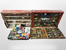 Two glazed wooden display cases containing diecast vehicles,