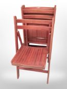 A set of four folding chairs