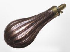 A 19th century copper and brass powder flask, length 20.5cm.