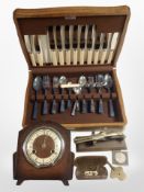 An oak canteen of cutlery, together with an oak mantel clock, pair of antique spectacles,