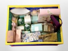 A crate of fragrances and cosmetics.
