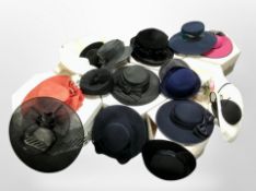 Several hat boxes containing a quantity of lady's formal dress hats.