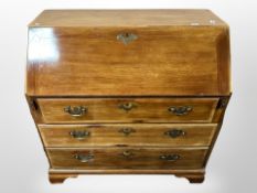 A 19th century Danish mahogany fall front bureau on bracket feet,