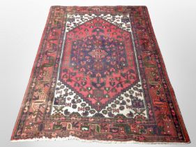 A Hamadan rug, North West Iran, 200cm x 132cm.