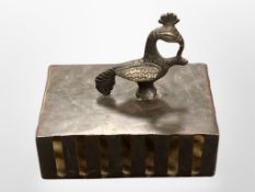 An Indian bronze Vajri (foot scrubber), 10.5 cm x 15.