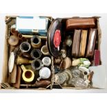 Two boxes containing continental pottery steins, carved wooden items, oil lamps, gents travel sets,