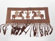 An Eastern tassled flat weave kilim, depicting figures on horse back,