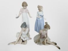 Four Nao figures of girls.