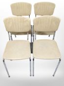 A set of four 20th century cream vinyl and chrome dining chairs