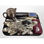 A group of silver-plated and stainless steel cutlery, photo frame, teapot, etc.
