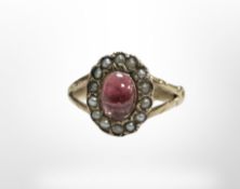 A 9ct yellow gold ruby and pearl cluster ring, size M. CONDITION REPORT: 1.