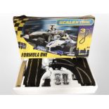 A Scalextric Formula-1 racing set in box.