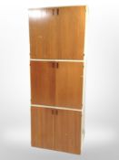 Three mid century Danish teak and double door stackable cupboards,