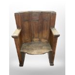 A Victorian panelled oak armchair with later presentation plaque, 'In Memory of Flying Officer W.M.