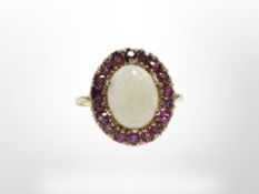 A 9ct yellow gold ruby and opal cluster ring, size L. CONDITION REPORT: 3.3g.