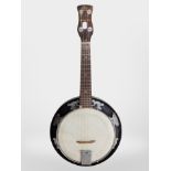 An early 20th century four-string banjo ukelele.