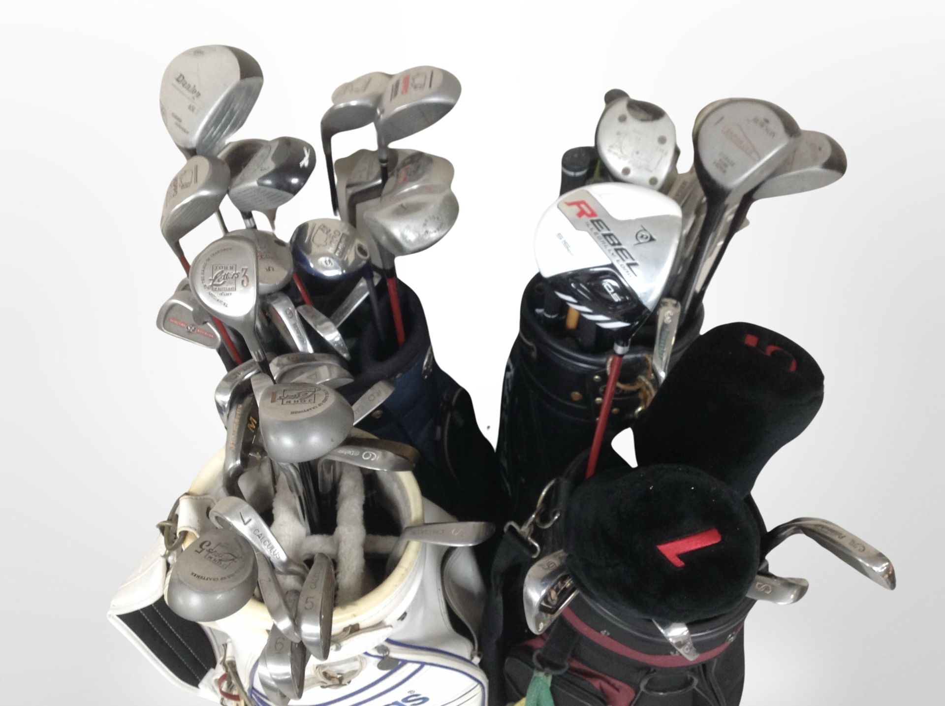 Several golf bags containing assorted drivers and irons including Dunlop, Howson, - Image 2 of 2