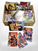 A box of modern comics including Fantastic Four, other Marvel titles, etc.