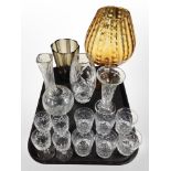 A group of glassware including set of six crystal tumblers, vases, oversized amber glass goblet,