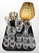 A group of glassware including set of six crystal tumblers, vases, oversized amber glass goblet,