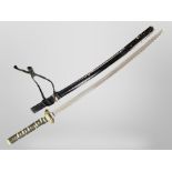 A reproduction Japanese katana in lacquered scabbard.