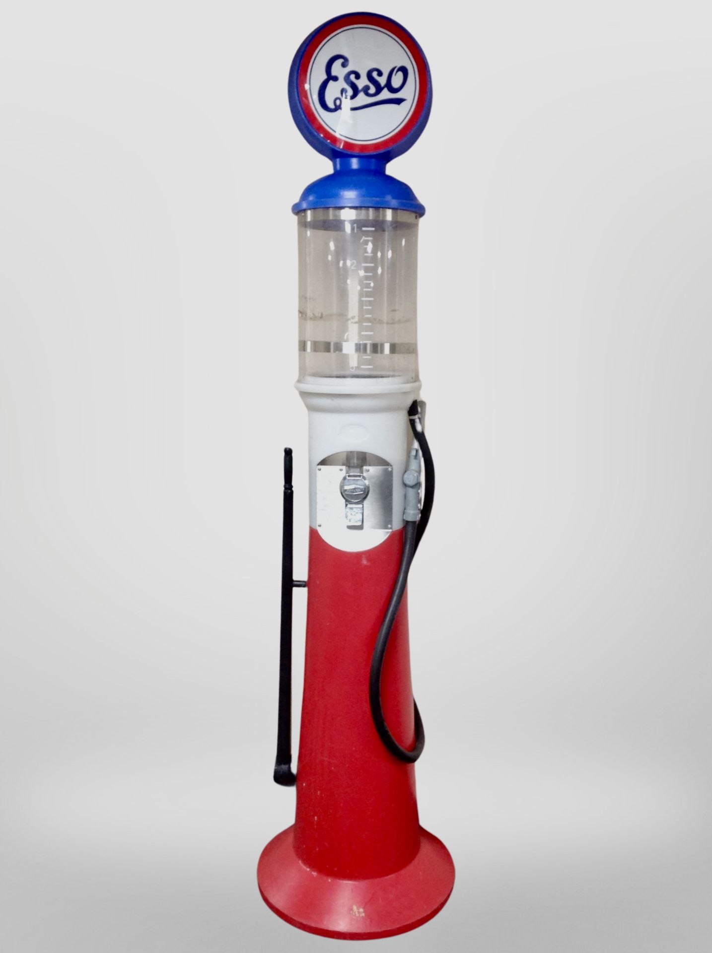 A plastic sweet dispenser in the form of a Esso petrol pump, height 226cm.