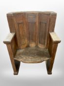 A Victorian panelled oak armchair with later presentation plaque, 'In Memory of W. T. S.
