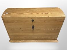 A 19th century Scandinavian pine domed topped blanket chest with cast iron handles,