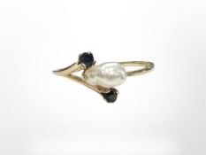 A yellow gold pearl and sapphire ring, size L/M. CONDITION REPORT: 0.7g.