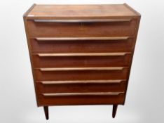 A 1970's Danish teak six drawer chest,